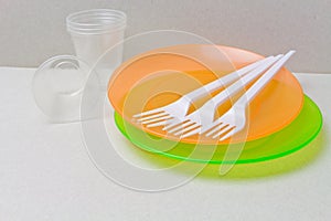 Plastic disposable tableware made of Plastic Raw material, polyethylene, polypropylene. BPA FREE concept. Disposable tableware ba