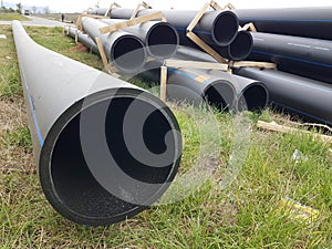 Plastic drainage pipes  pile connecting each other by the road