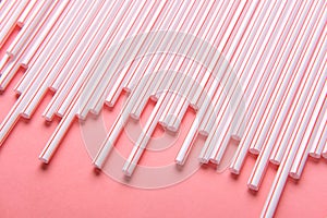 Plastic Drinking Straw Isolated on Pink Background Flat Lay Top View