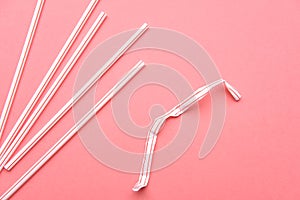 Plastic Drinking Straw Isolated on Pink Background Flat Lay Top View