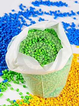 plastic dye granules in a bag of polymers, multi-colored plastic dye