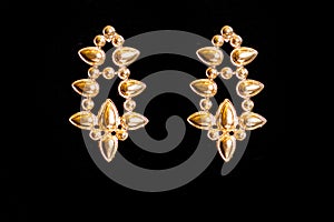 Plastic earrings gold photo