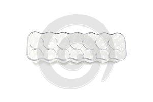 Plastic eggs box isolated on white background.