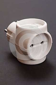 Plastic electrical tee on a black background