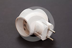 Plastic electrical tee on a black background