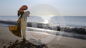 Plastic figure stick young people love girl guy hugging sand beach of sea coast