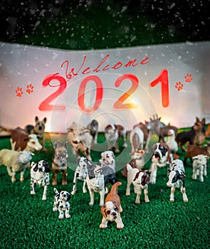 Plastic figurines of dogs and farm animal celebrates the 2021 new year