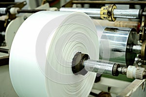 Plastic film is collected into rolls