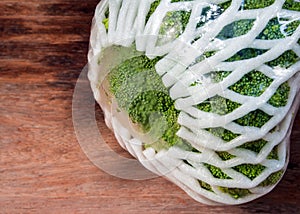 Plastic film wrap protect for Broccoli vegetable by plastic wrap