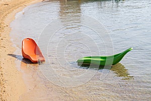 Plastic floating on the water sun loungers. Beach equipment