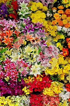 Plastic flowers background