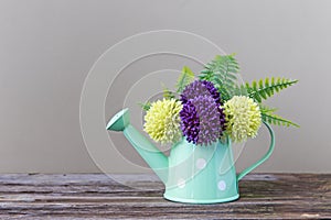 Plastic flowers and vase