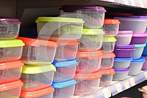 Plastic food containers on the shelf in the store