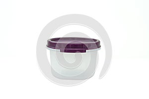 Plastic food cup with purple lid isolated