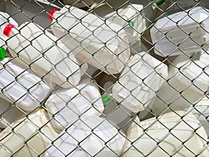 Plastic gallon in the cage