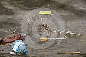 Plastic garbage floating in river. Environment pollution problem