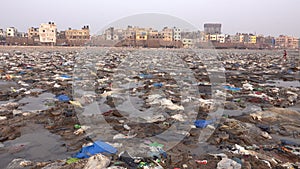 Plastic garbage and other pollution on beach in Mumbai, India