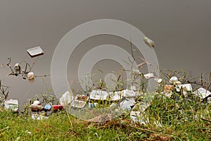 Plastic garbage in the river , pollution and environment in water