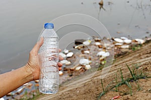 Plastic garbage in the river , pollution and environment in the water