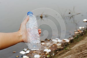 Plastic garbage in the river , pollution and environment in the water