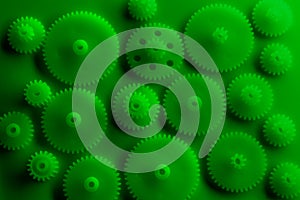 Plastic gears compilation on a green background. Spare parts for your RC toy. Background picture.