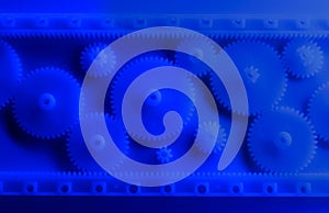 Plastic gears compilation on a neon blue background. Spare parts for your RC toy. Background picture.