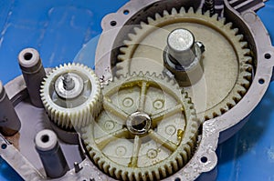 Plastic gears of a disassembled gearbox in a repair shop