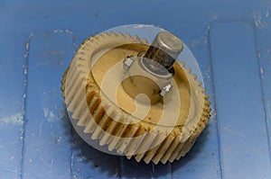 Plastic gears of a disassembled gearbox in a repair shop