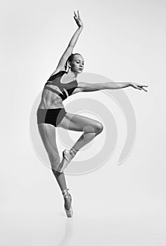 Plastic girl in pointe shoes b&w