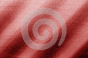 Plastic glittering texture in red tone