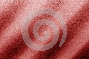 Plastic glittering texture in red tone