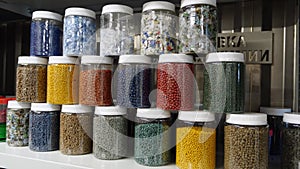 Plastic granules and pellets, Raw different colors recycled polymer materials for plastic products. The plastic factory