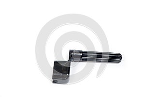 Plastic guitar string winders in black, shot on a white background