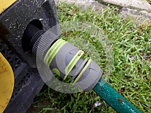 Plastic hose connector connected to a pressure