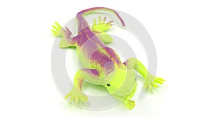 Plastic house lizard toy isolated on white background