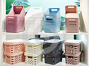 Plastic household containers in store