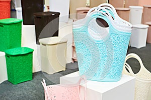 Plastic household containers in store