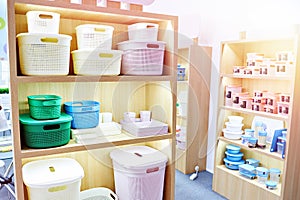 Plastic household containers in store