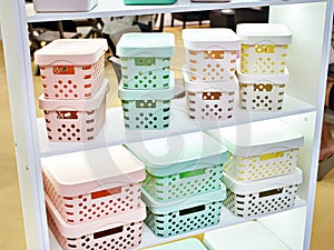 Plastic household containers in store