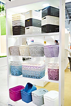 Plastic household containers in store