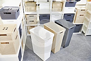 Plastic household containers in store