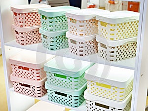 Plastic household containers in store