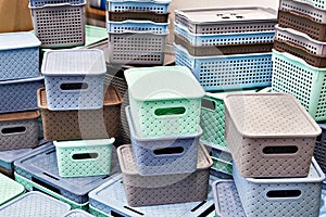 Plastic household containers in store