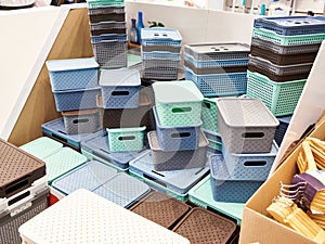 Plastic household containers in store