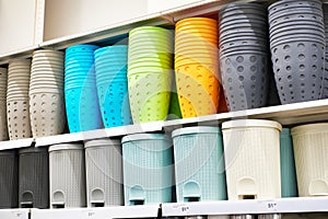 Plastic household containers in store