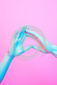 Plastic human hands touching. Artificial emotions background.