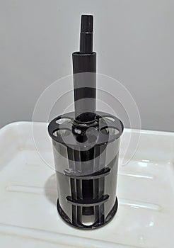 Plastic insert or developing reel with six large format negatives