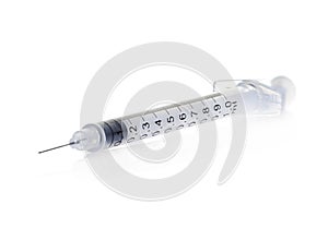 Plastic insulin syringe isolated on white