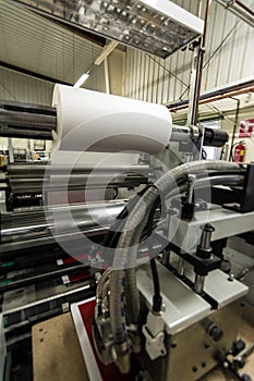 Plastic laminating machine professional in a printing press