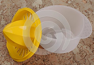 Plastic lemon-squeezer